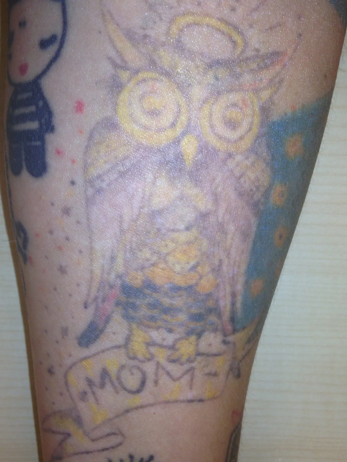 Color tattoo removal of the owners tattoo.  Tattoo fading for coverups
